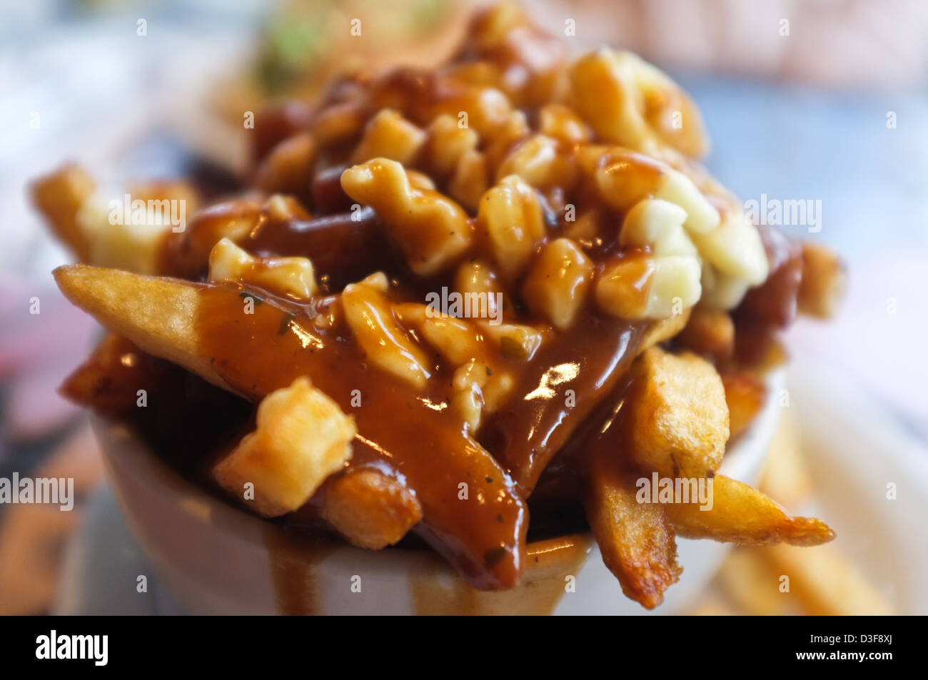 La poutine est un fast-food qui provenaient du Québec, Canada Banque D'Images