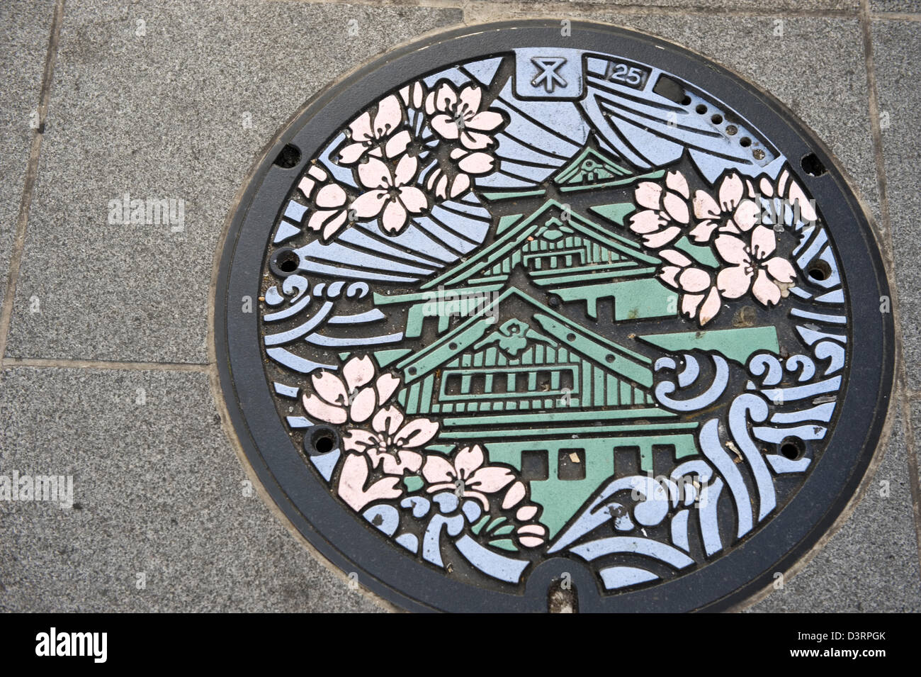 Ce couvercle coloré représente l'art d'Osaka avec fleurs de cerisier rose. Banque D'Images