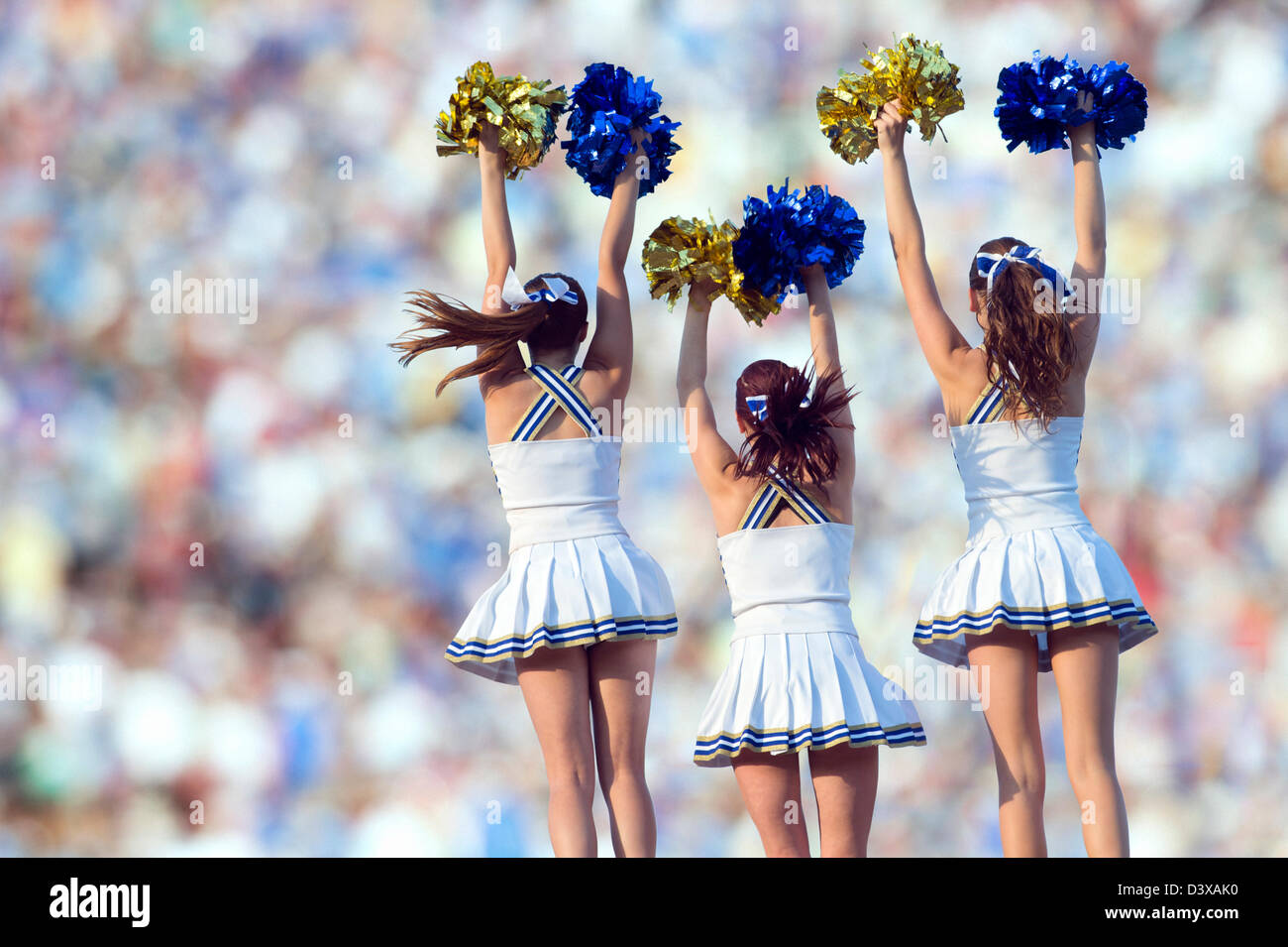 Caucasian cheerleaders posing together Banque D'Images