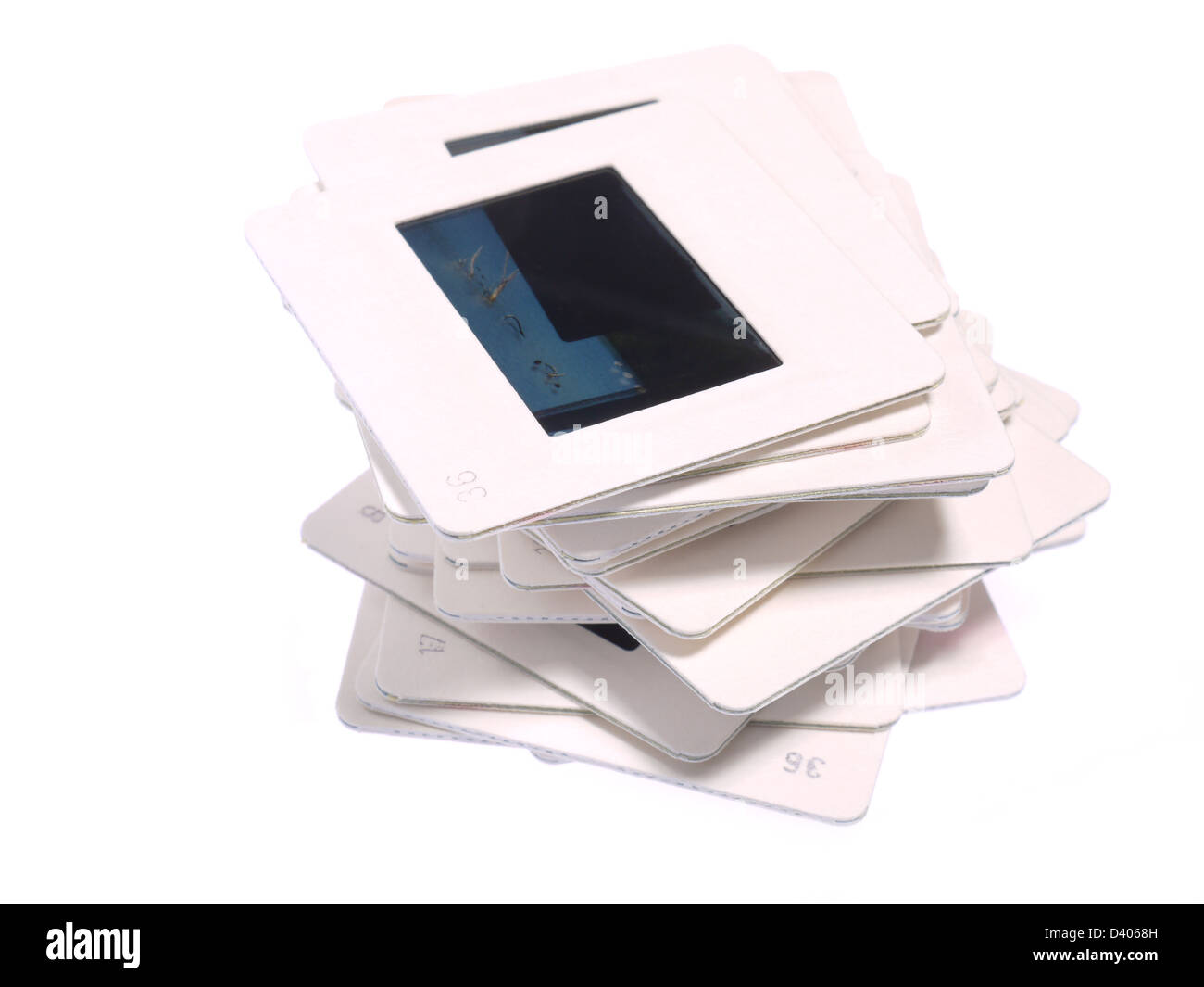 Pile de diapositives 35 mm avec bordure blanche shot on white Banque D'Images