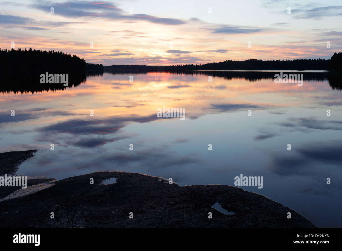 Silvkoparen, Suède, au coucher du soleil sur un lac Silvkoparen Banque D'Images