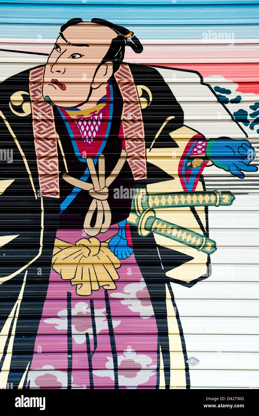 L'Ukiyo-e traditionnel peint style ornent un magasin de détail déclencheur dans l'ancien quartier des divertissements d'Asakusa, Tokyo. Banque D'Images