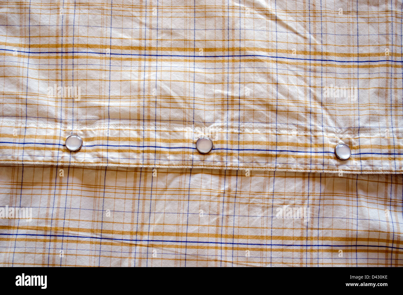 , Gros plan tissu pantalon long avec thread malpropre. twist Banque D'Images