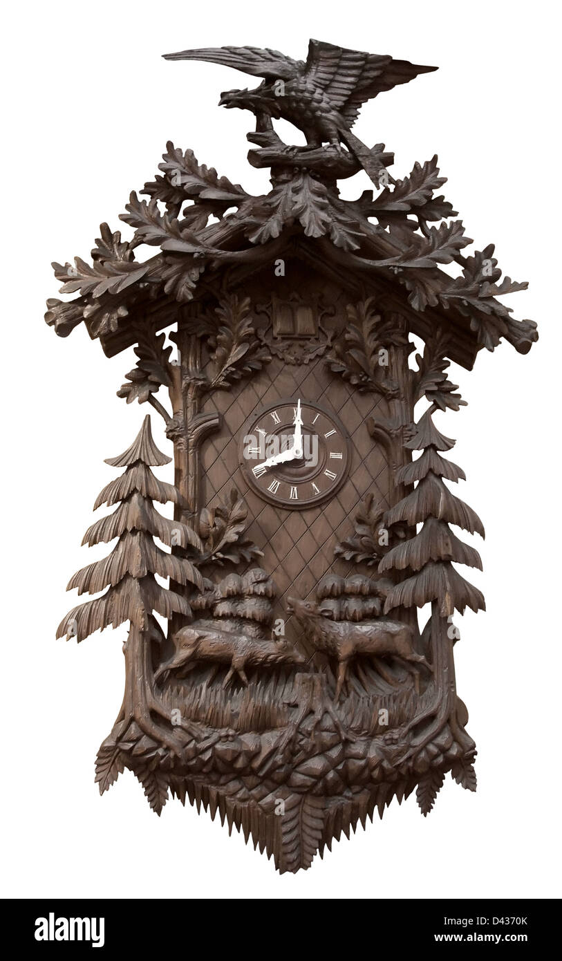 Une riche forêt noire traditionnel décoré dans horloge coucou blanc retour Banque D'Images