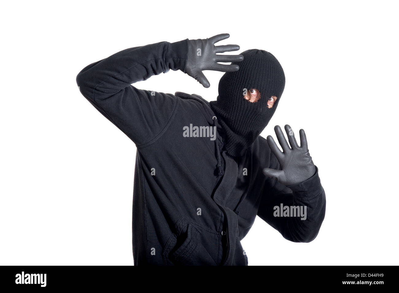 Attraper le voleur, voleur concept avec balaclava capturés, isolé sur fond blanc Banque D'Images