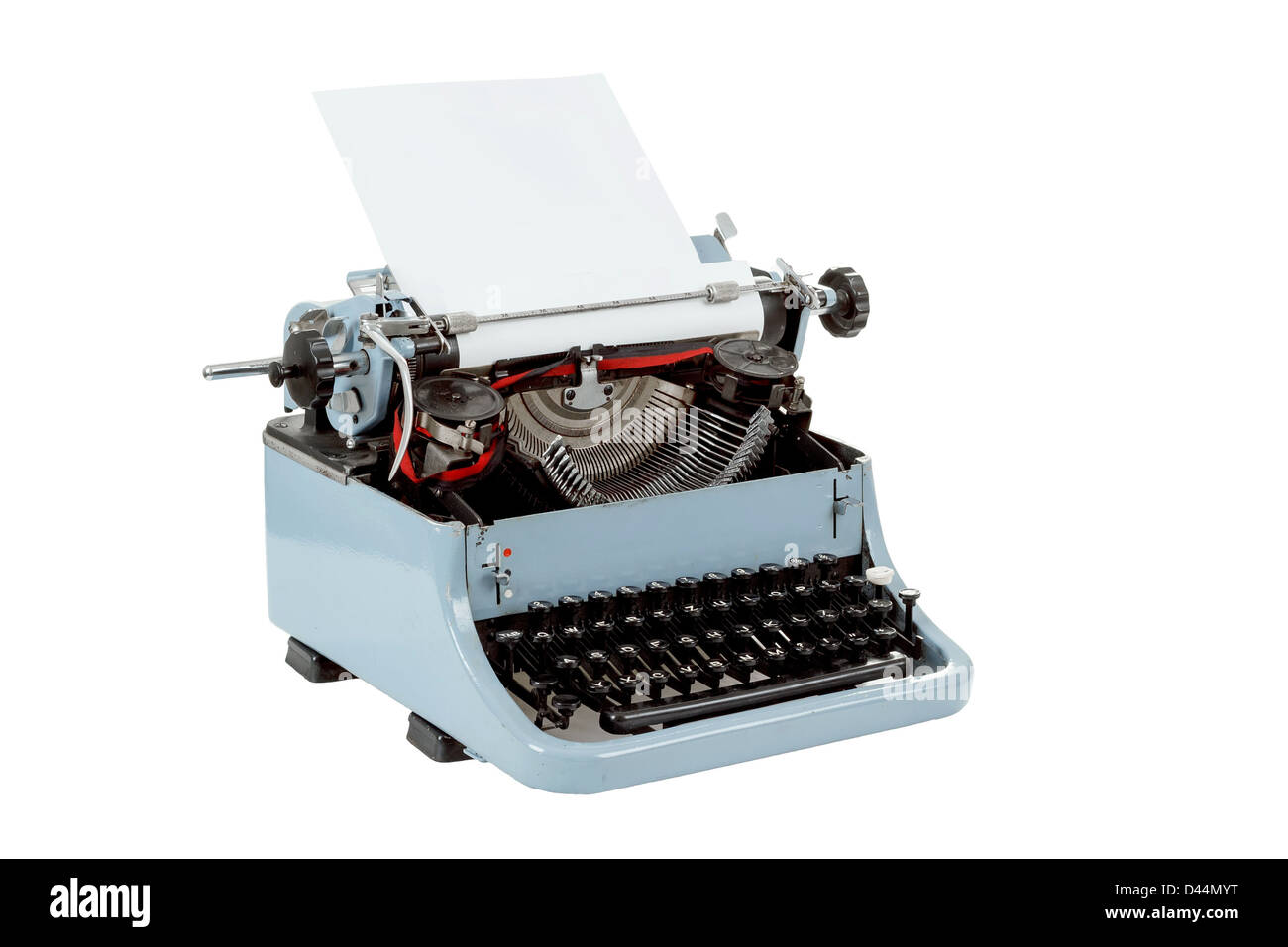 Machine à écrire rétro bleu découvert sur fond blanc Banque D'Images