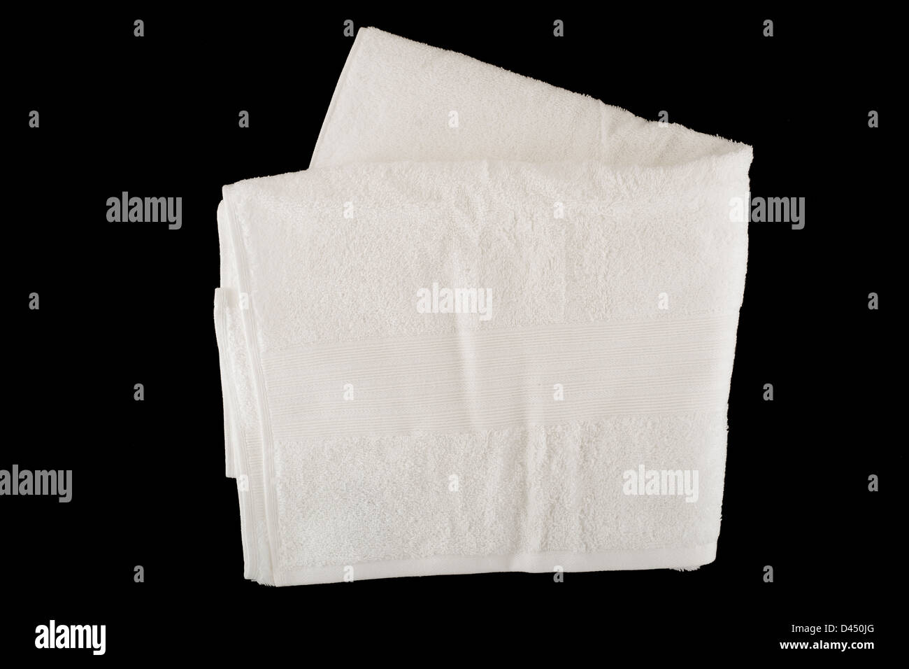 Serviette de bain pliée blanc en coton égyptien doux au toucher Banque D'Images