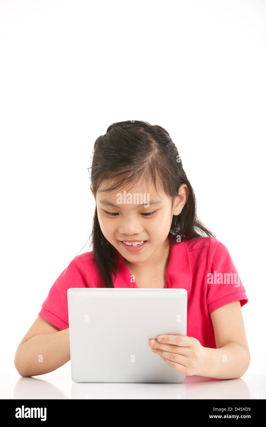 Studio Shot of Chinese Girl with Digital Tablet Banque D'Images