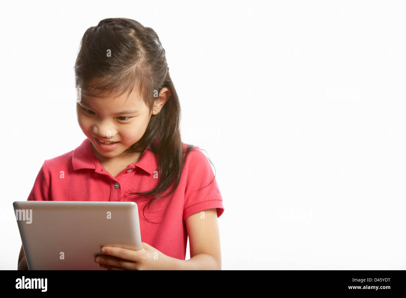 Studio Shot of Chinese Girl with Digital Tablet Banque D'Images