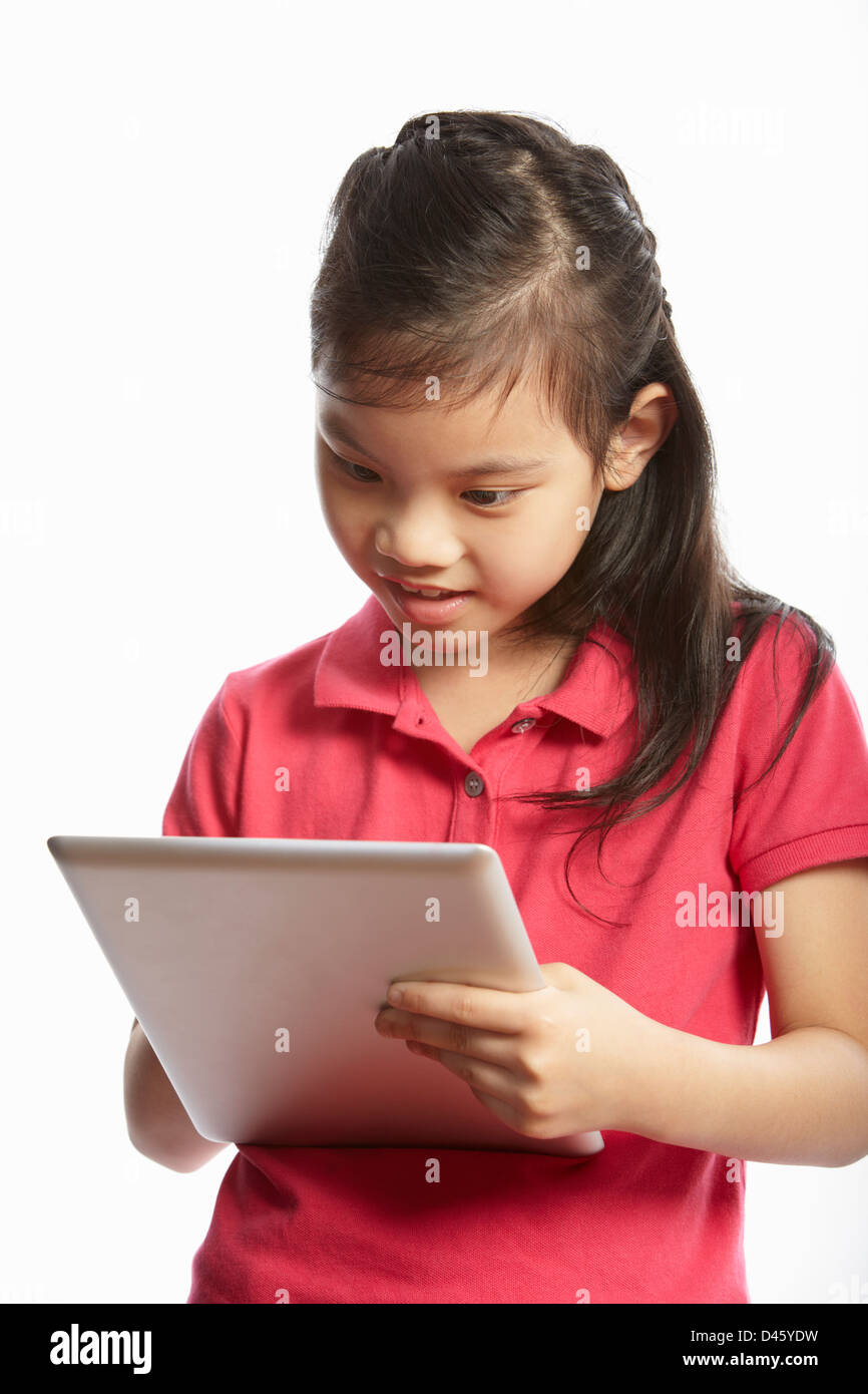 Studio Shot of Chinese Girl with Digital Tablet Banque D'Images
