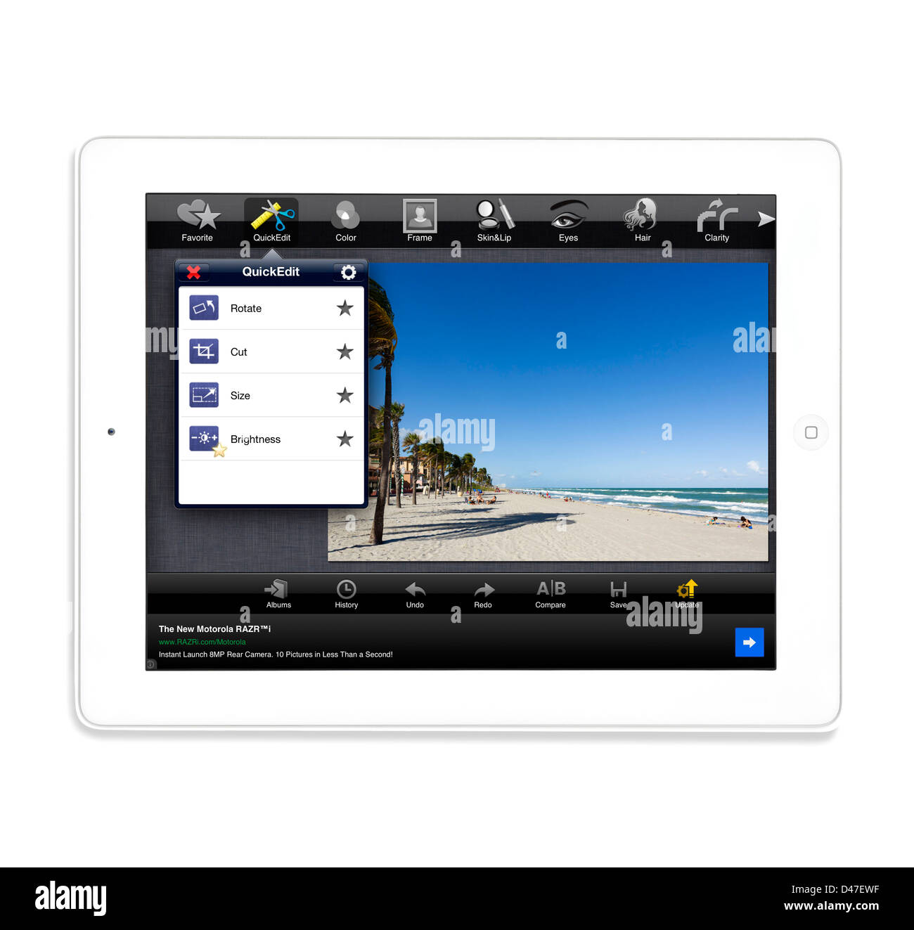 Modification d'une photographie à l'Fotolr HD app gratuite sur une 4ème génération d'Apple iPad, USA Banque D'Images