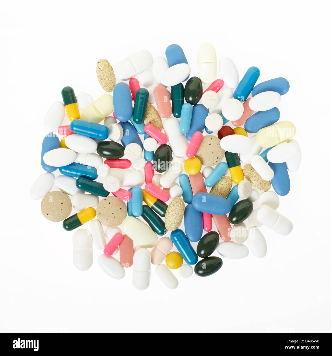 Comprimés et gélules médicaux colorés heap Banque D'Images