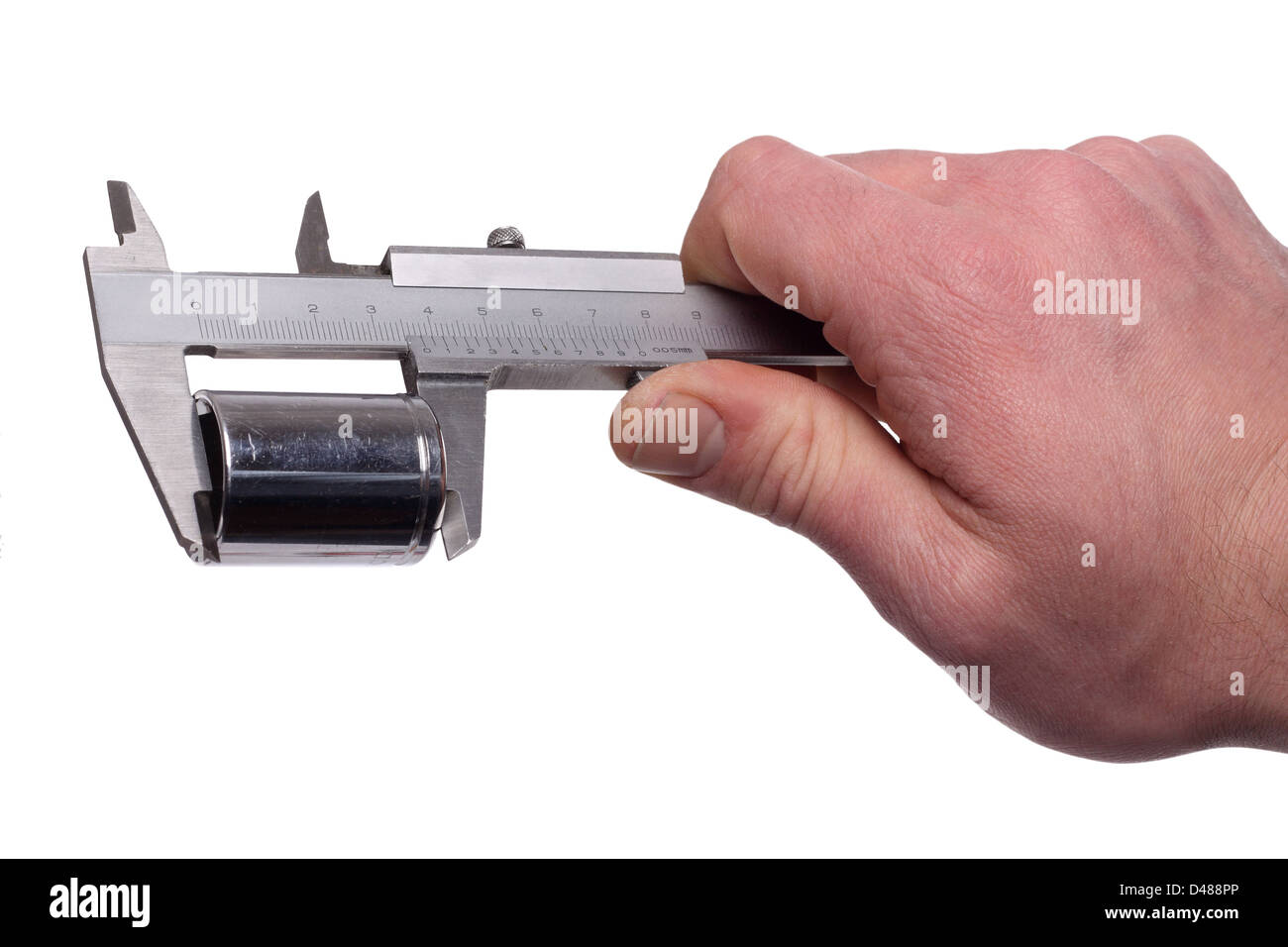 Une mesure avec un compas d'Objekt Metall. Banque D'Images
