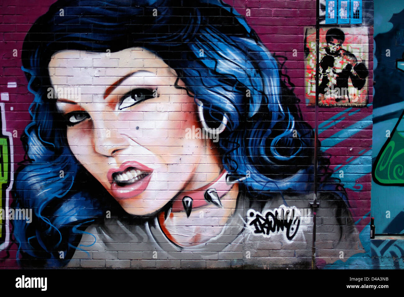 L'art de rue sur un mur à Shoreditch, East London Banque D'Images