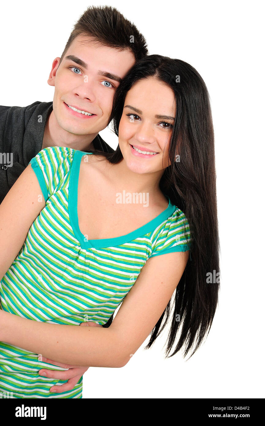 Les jeunes isolés casual couple présentant Banque D'Images