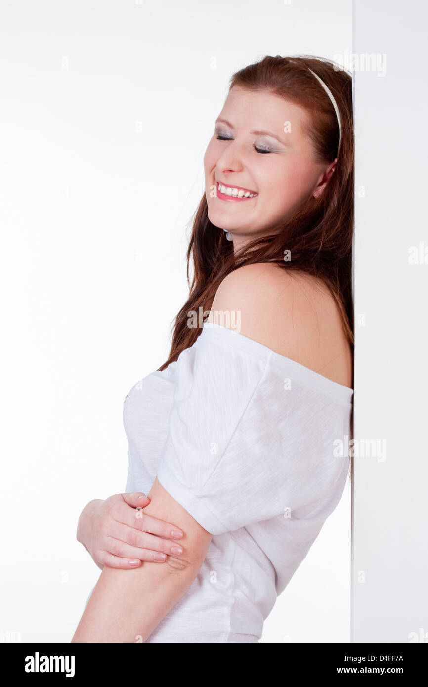 Young Beautiful woman smiling avec ses yeux fermés Banque D'Images