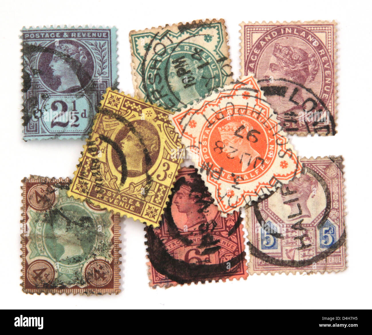 Assortiment Victorian timbres-poste sur un fond blanc. Banque D'Images