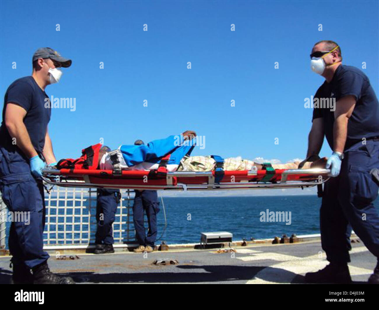 US Coast Guard l'évacuation sanitaire haïtien blessé Banque D'Images