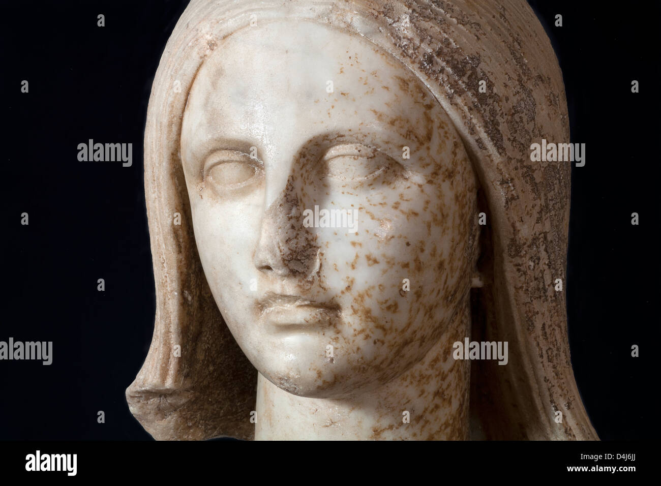 Sculpture en marbre femelle de romaine ruine de Munigua, Séville, Espagne. Détail du visage Banque D'Images