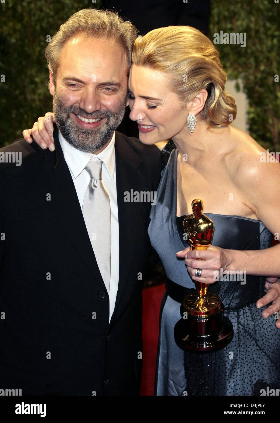 L'actrice Kate Winslet et le réalisateur Sam Mendes arrivent à la Vanity Fair Oscar Party Tours au coucher du soleil à West Hollywood, Los Angeles, USA, dimanche, 22 février 2009. Photo : Hubert Boesl Banque D'Images