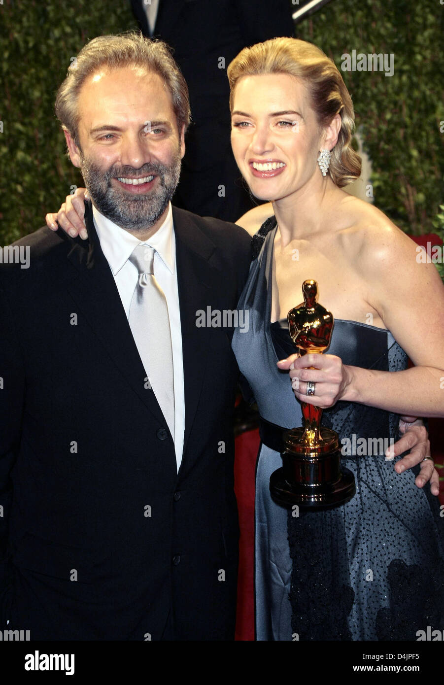 L'actrice Kate Winslet et le réalisateur Sam Mendes arrivent à la Vanity Fair Oscar Party Tours au coucher du soleil à West Hollywood, Los Angeles, USA, dimanche, 22 février 2009. Photo : Hubert Boesl Banque D'Images