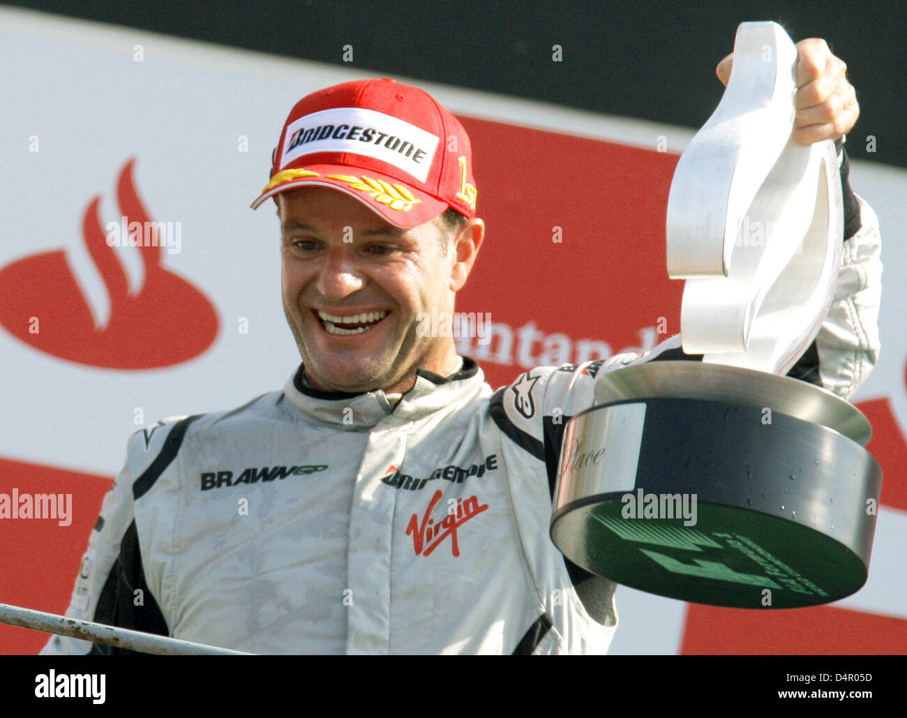 De brésilien Rubens Barrichello Brawn GP célèbre sur le podium après avoir remporté le Grand Prix d'Italie à la Formule Un seul circuit de Monza, Italie, le 13 septembre 2009. Photo : JENS BUETTNER Banque D'Images