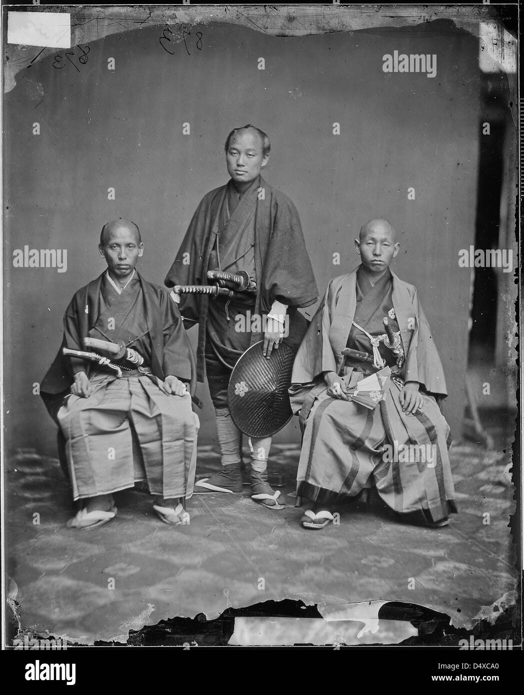 Une photographie de trois Japonais, dont Domin Kawasaki, médecin dans la mission de 1860 pendant la guerre de Sécession. Prise par Mathew Brady. Banque D'Images