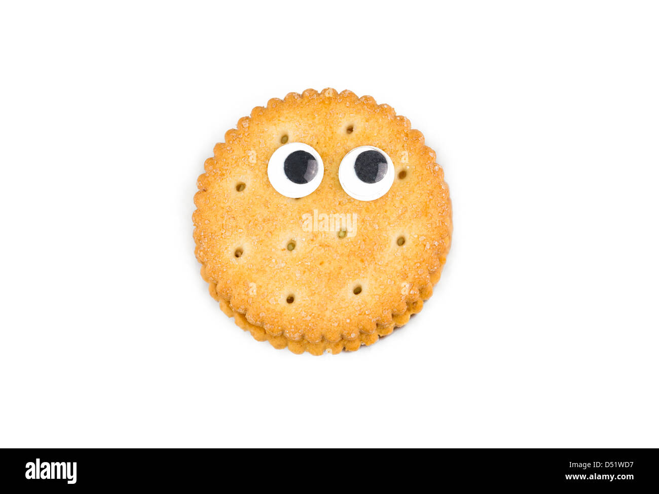 Décorées avec des yeux drôle cookie isolé sur fond blanc Banque D'Images