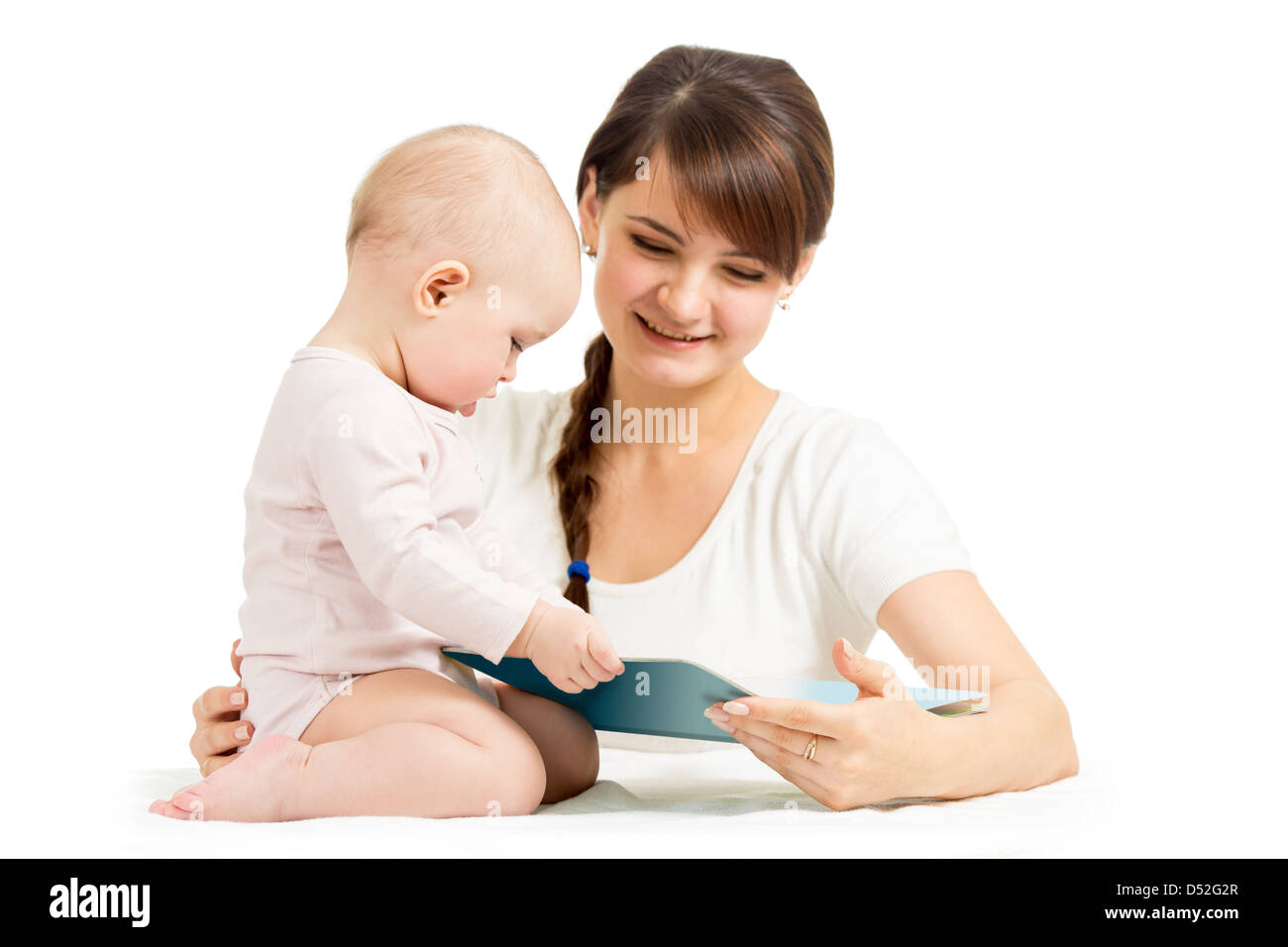 Heureuse Mère et enfant lisant un livre Banque D'Images