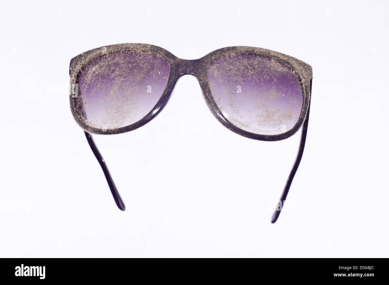 Les verres de lunettes bleu poussiéreux Banque D'Images