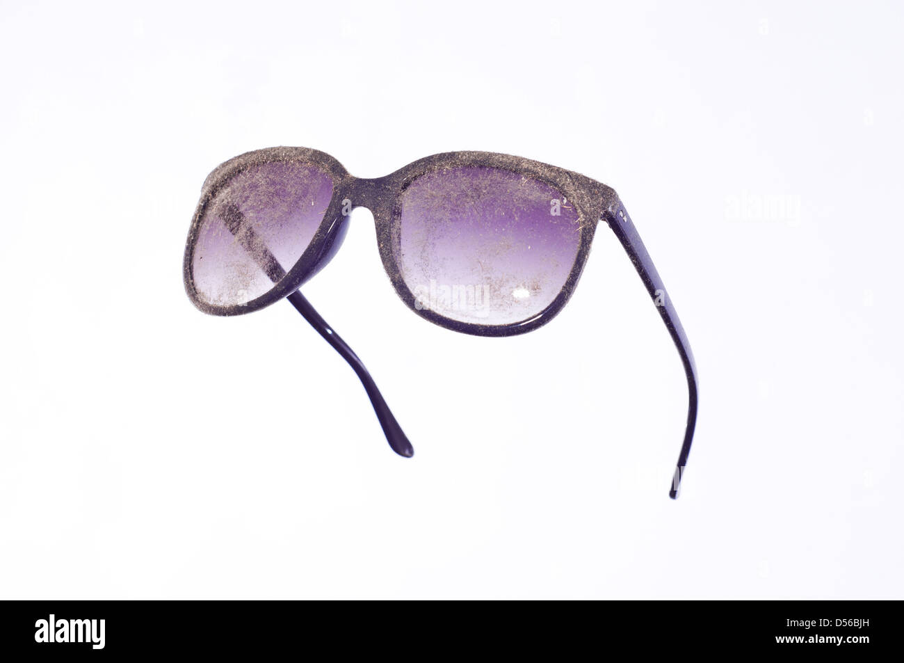 Les verres de lunettes bleu poussiéreux Banque D'Images