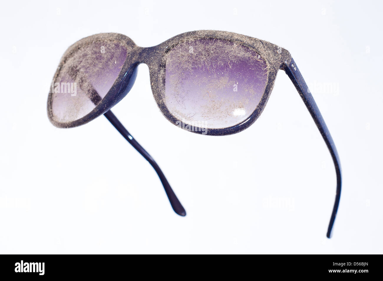 Les verres de lunettes bleu poussiéreux Banque D'Images