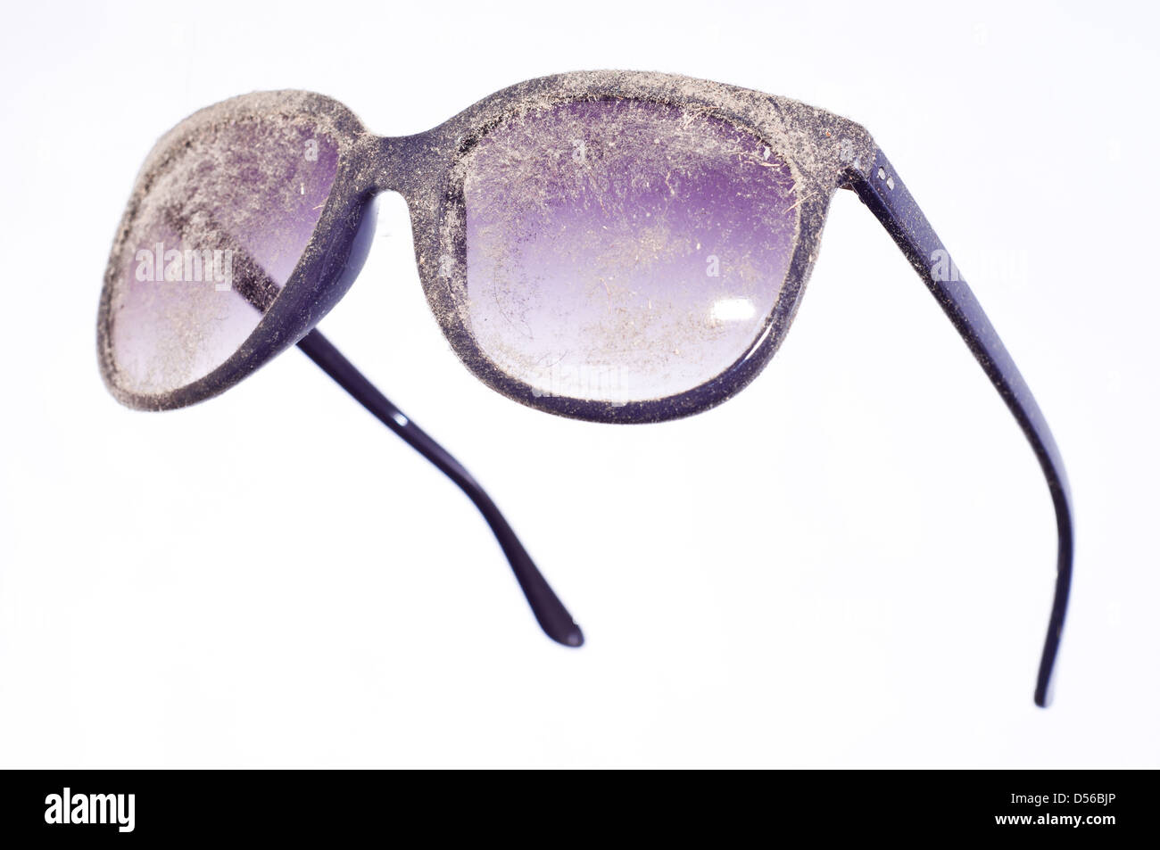 Les verres de lunettes bleu poussiéreux Banque D'Images