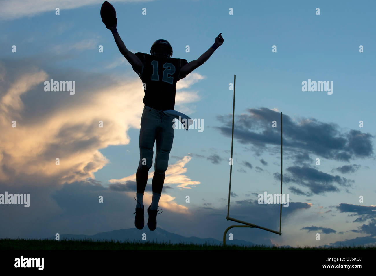 Football player cheering in game Banque D'Images