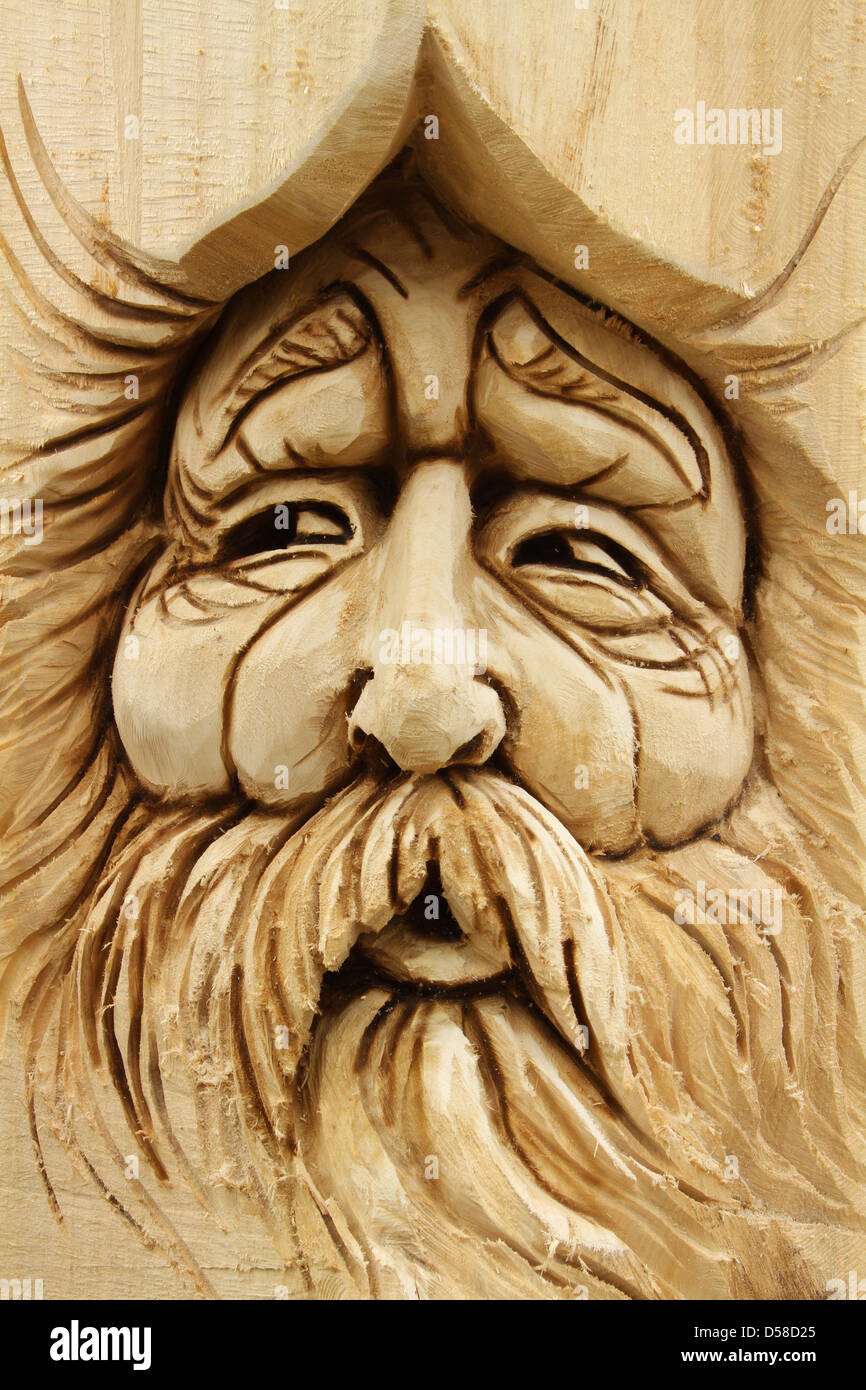 Chainsaw sculpture de visage par Ben Risney. Banque D'Images