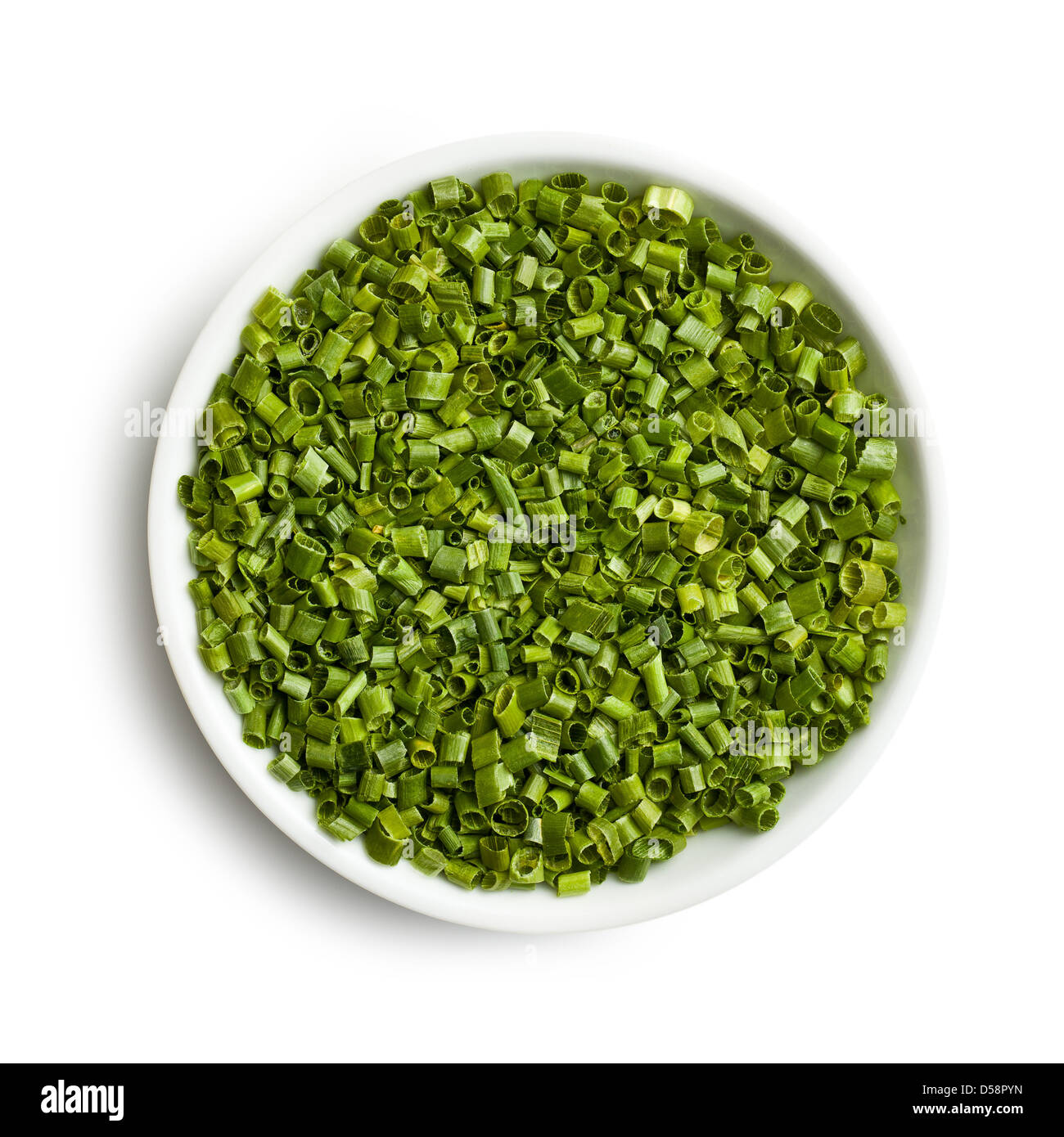 Le ​​Green la ciboulette dans un bol en céramique Banque D'Images