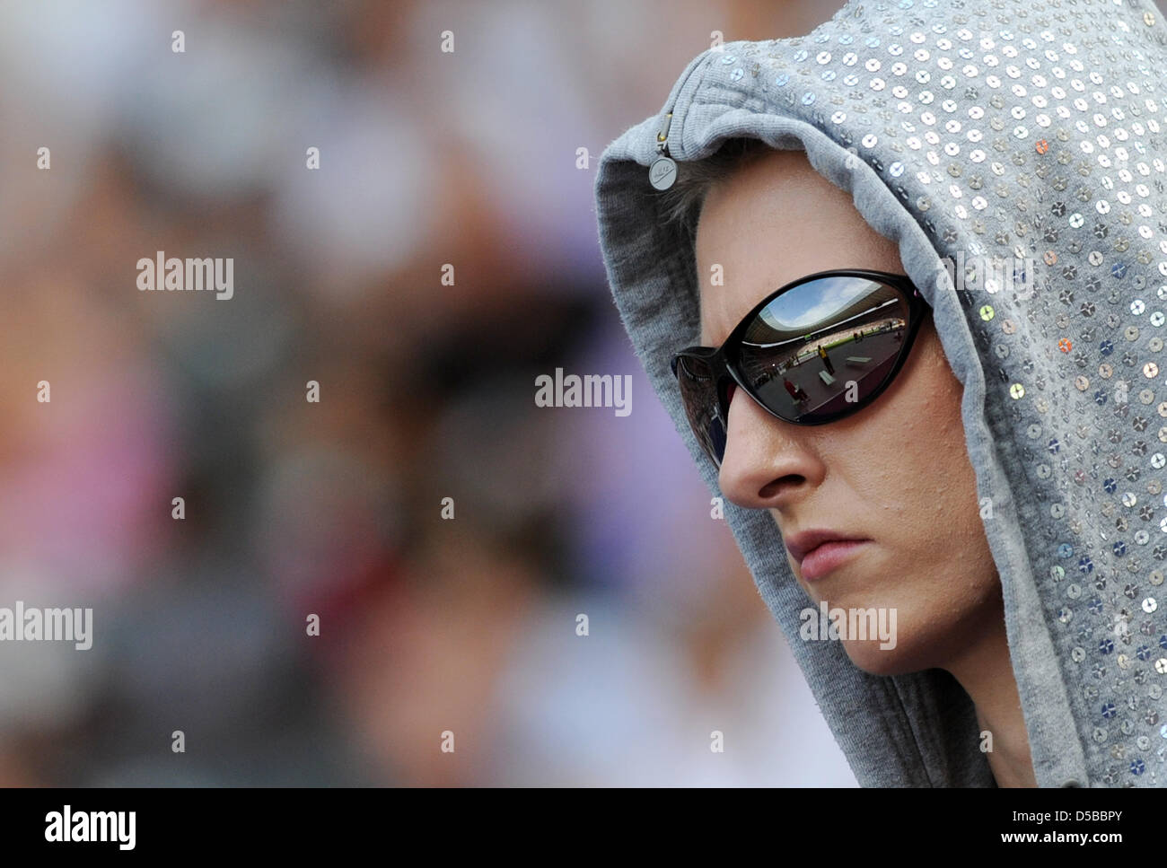 Le stade olympique se reflète dans les lunettes miroir porté par l'Allemand Friedrich Ariane cavalier élevé au défi mondial ISTAF de Berlin, Allemagne, 22 août 2010. Friedrich a remporté le concours. Photo : Rainer Jensen Banque D'Images