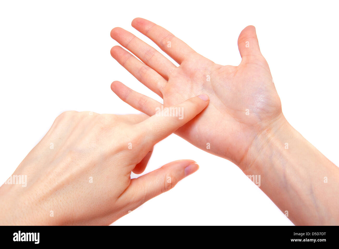 La chiromancie  : lecture des lignes de la mains dans a woman's hand isolé sur fond blanc Banque D'Images