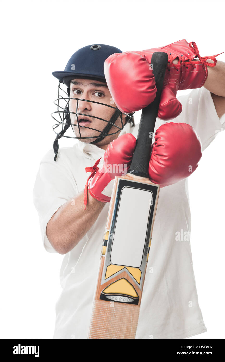 Jouer au cricket batteur Banque D'Images