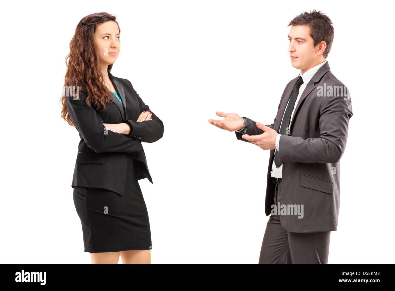 Young businesspeople having a conversation isolé sur fond blanc Banque D'Images