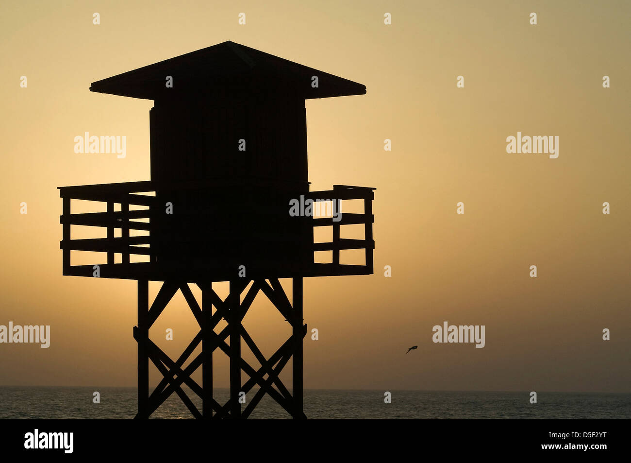 Coucher du soleil sur la plage de Victoria à Cadix, Espagne. © Miguel Gomez Banque D'Images
