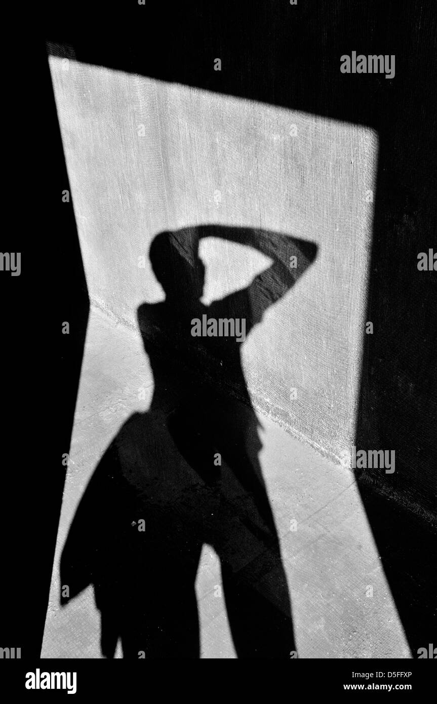 Self-portrait in shadows Banque D'Images