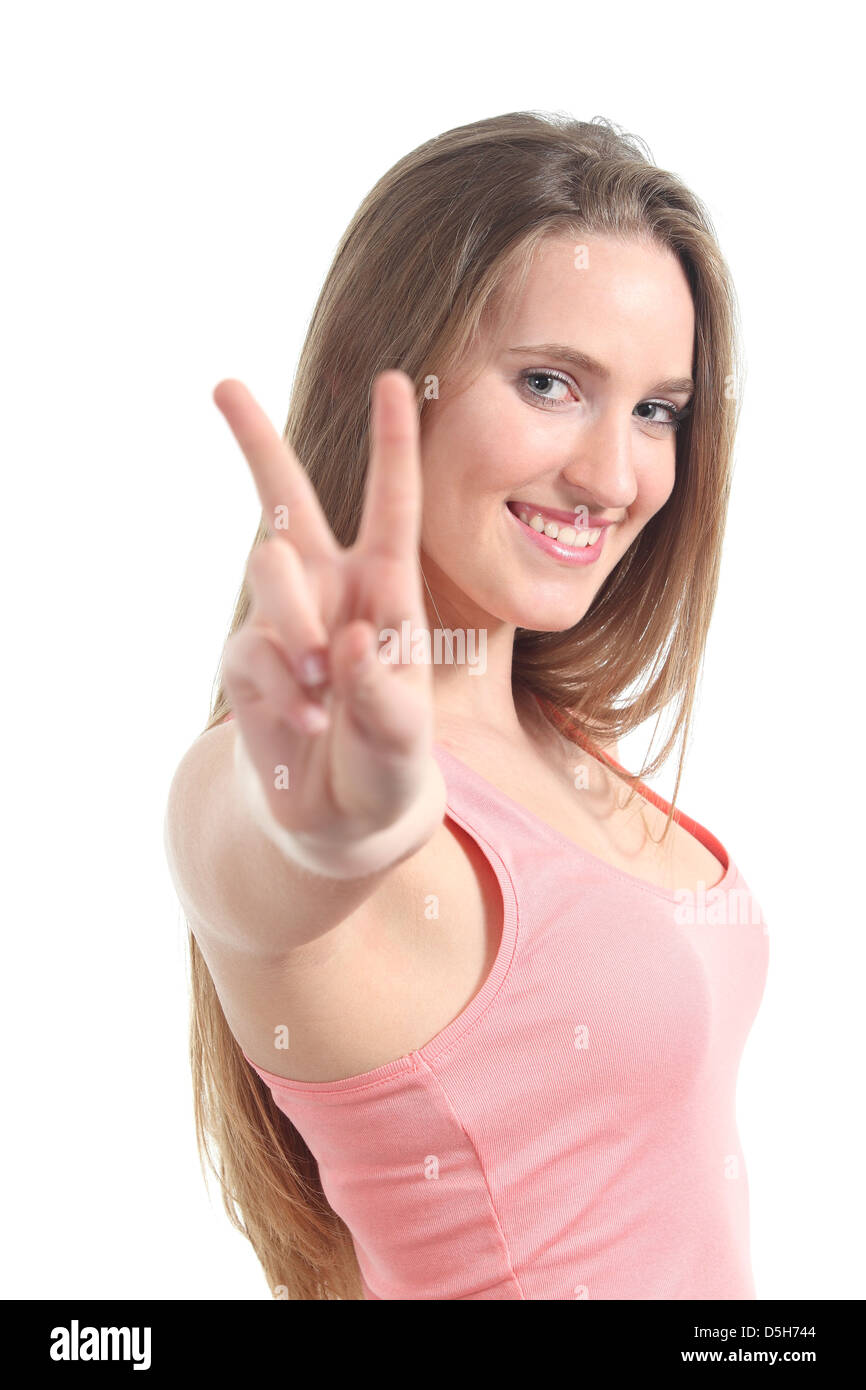 Belle jeune femme faisant le geste de la paix ou la victoire isolé sur fond blanc Banque D'Images