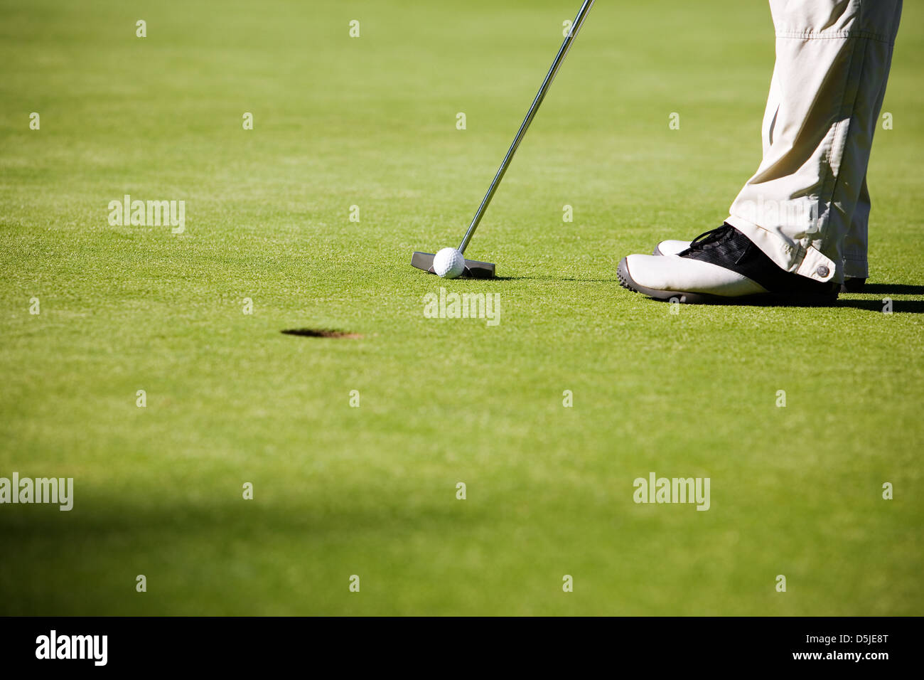 La mise au point sélective, golfeur sur balle de golf Banque D'Images