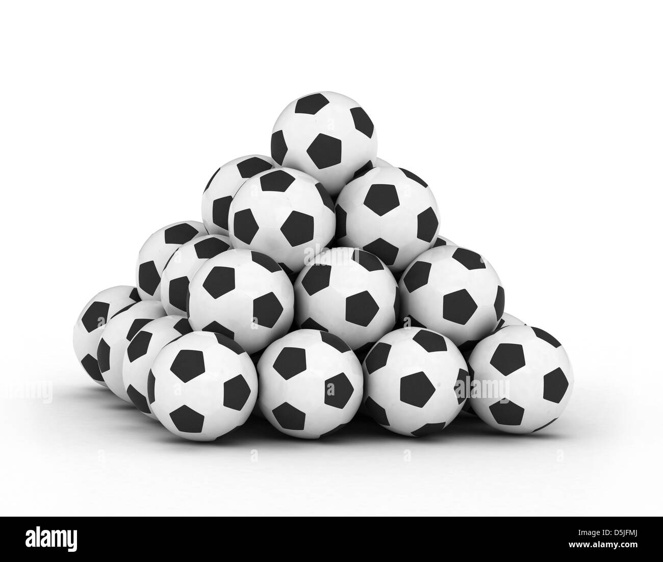 Pile d'empiler les ballons de football football sur fond blanc Banque D'Images
