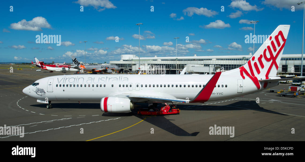 Virgin Australia 320 Airbus laissant c'est se tenir à l'aéroport de Sydney Banque D'Images