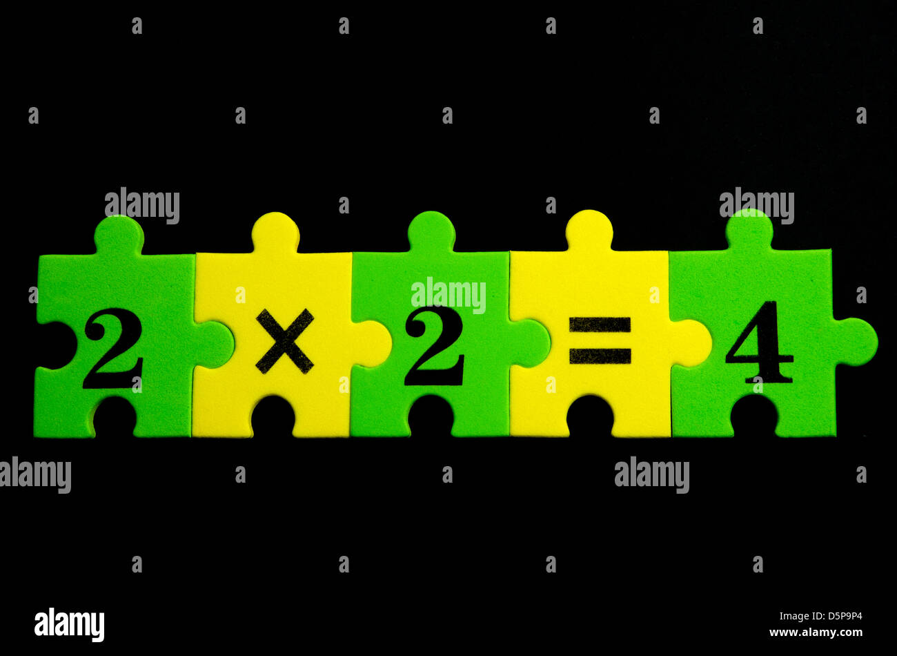 Pièces de puzzle texturé coloré de multiplication Banque D'Images