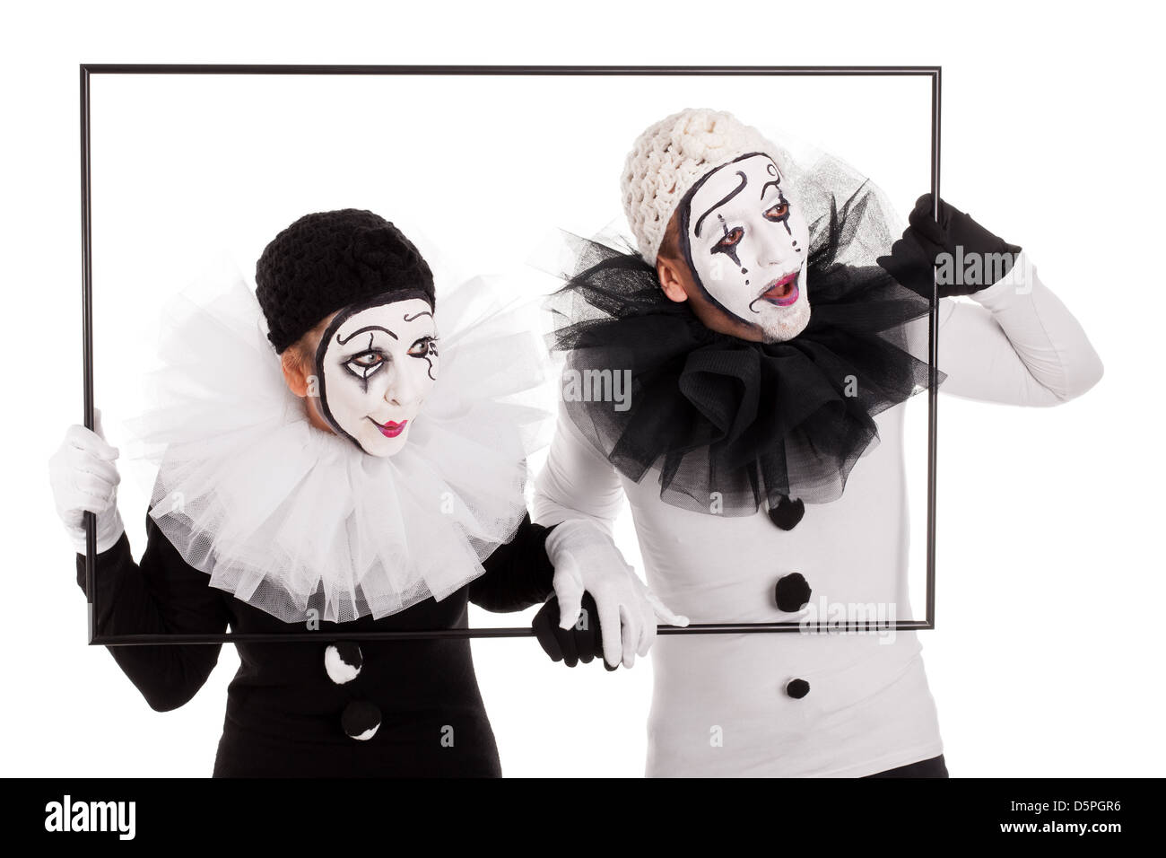 Couple de clowns dans un cadre à la recherche dans le même sens Banque D'Images