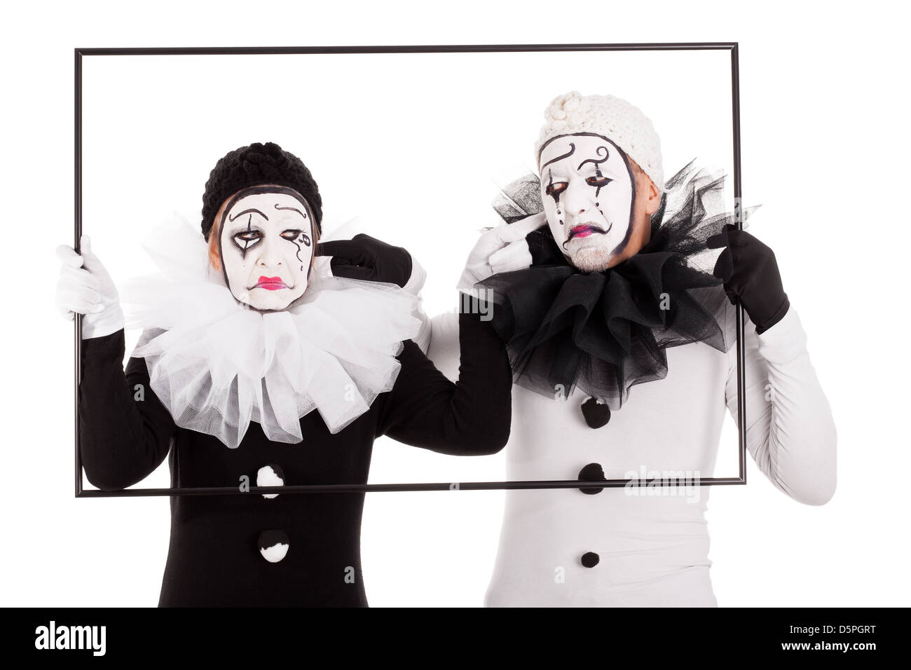 Couple de clowns dans un cadre ne s'entendre Banque D'Images