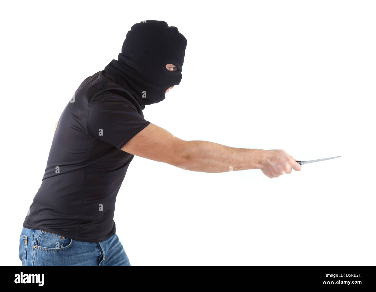 L'homme à un masque avec un couteau sur un fond blanc Banque D'Images